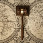 gavel-on-old-world-map-stock-image