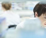 Female-scientist-in-a-busy-research-lab-Stock-image-(1)